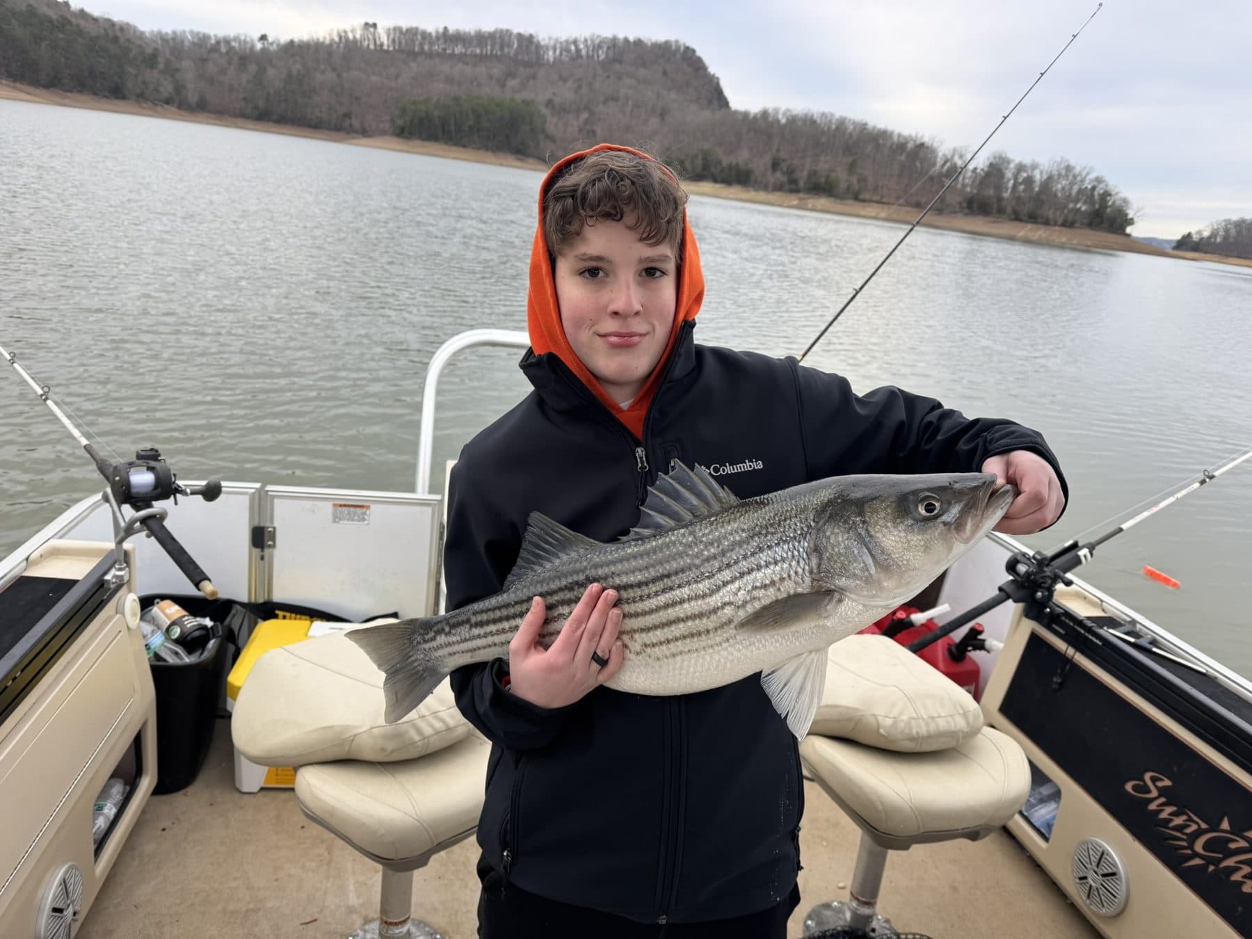 A young angler with a solid fish