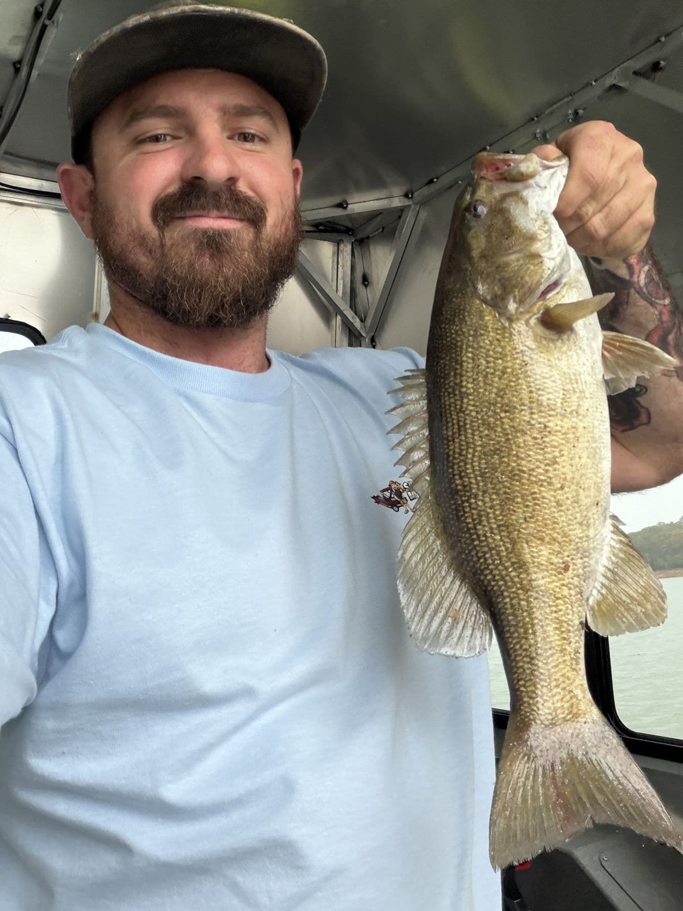 A solid striper boatside