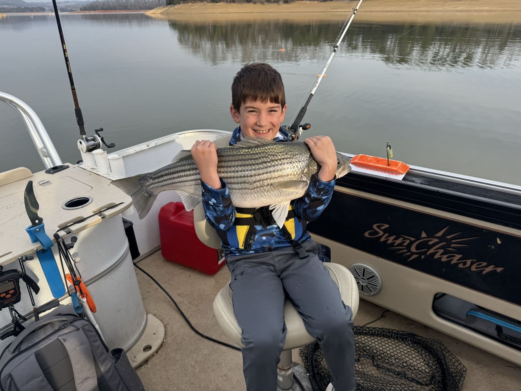 A young angler with a keeper